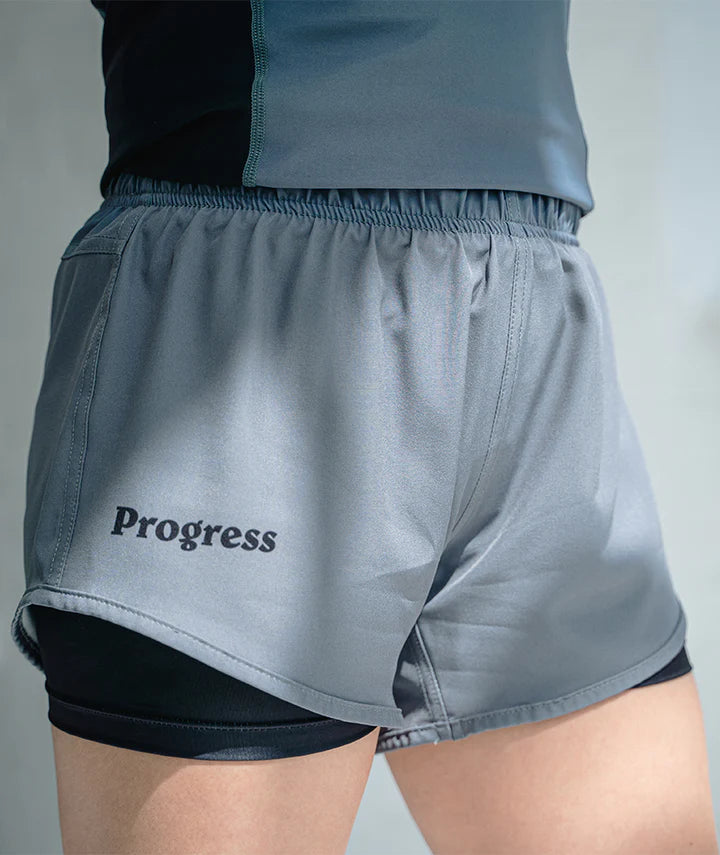Short hybride Progress Academy + gris pour femme