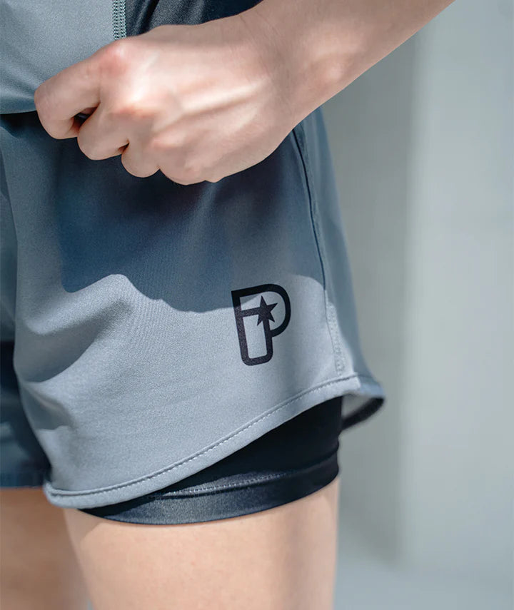 Short hybride Progress Academy + gris pour femme