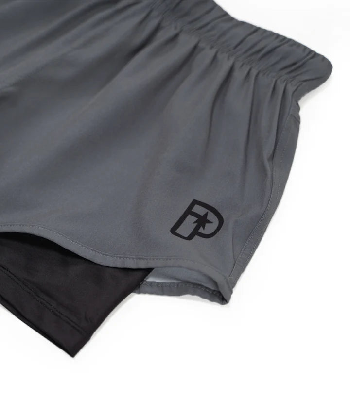 Short hybride Progress Academy + gris pour femme