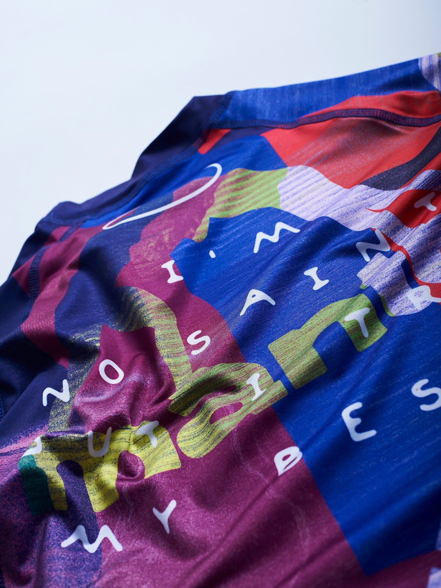 Rashguard MANTO NÉON ABSTRAIT