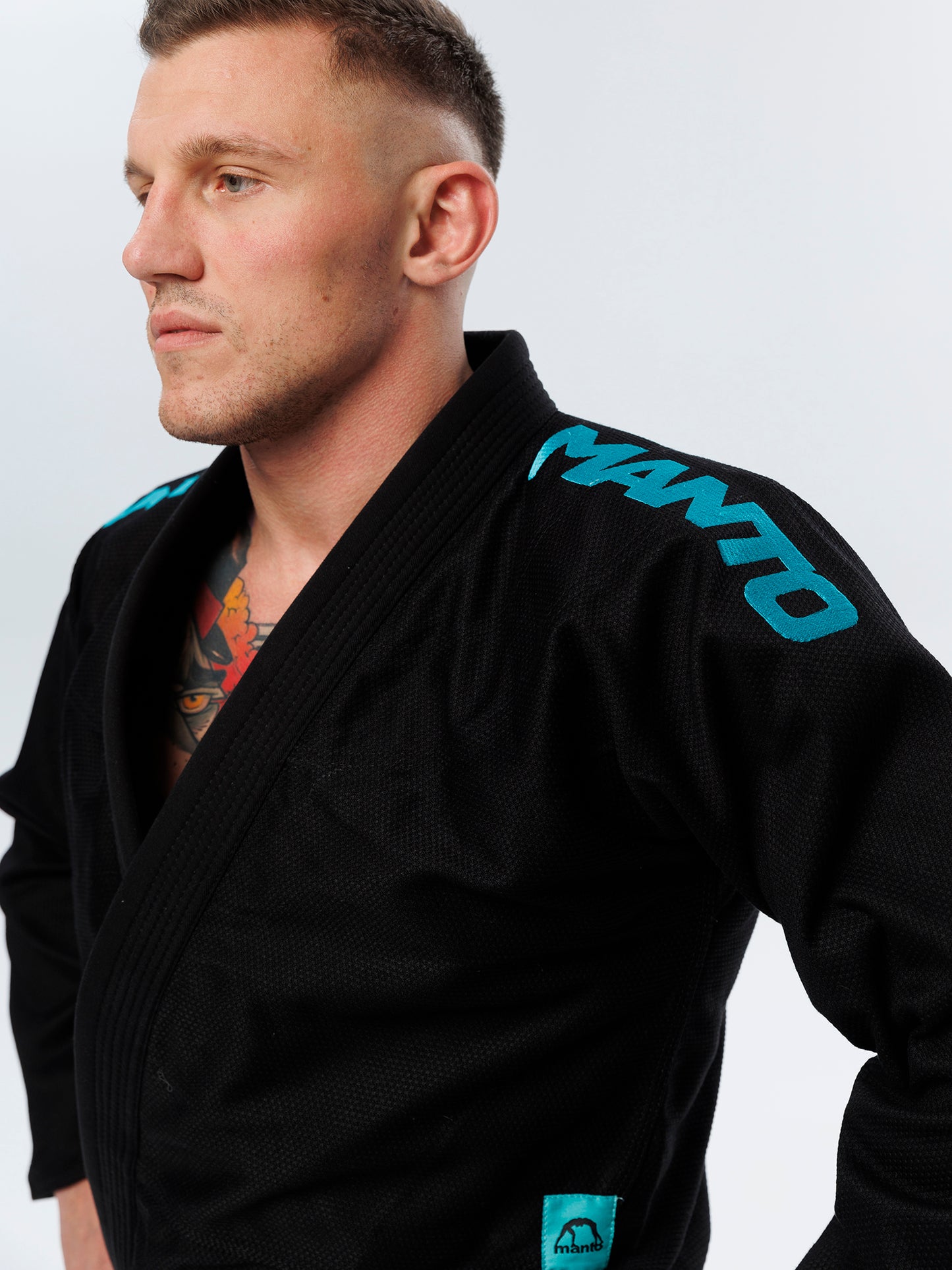 MANTO "X5" BJJ GI nero - turchese